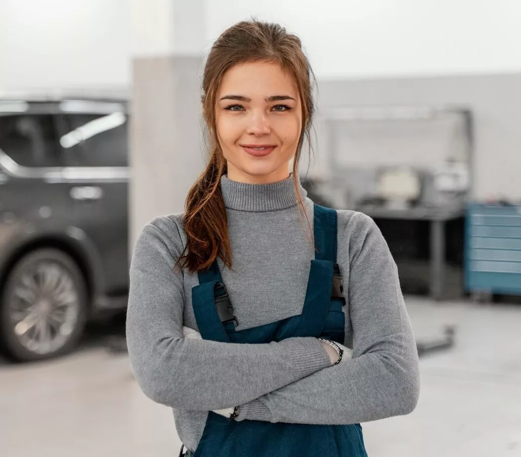 smiley-woman-working-car-service_23-2148826532.jpg